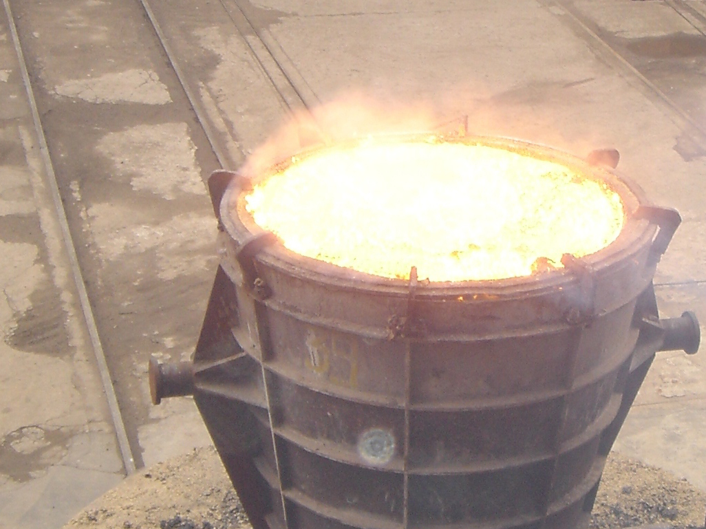 When fusing is complete, the molten content is poured into a receiver. Due to extreme high temperature, the content takes few days to cool to form ingots.